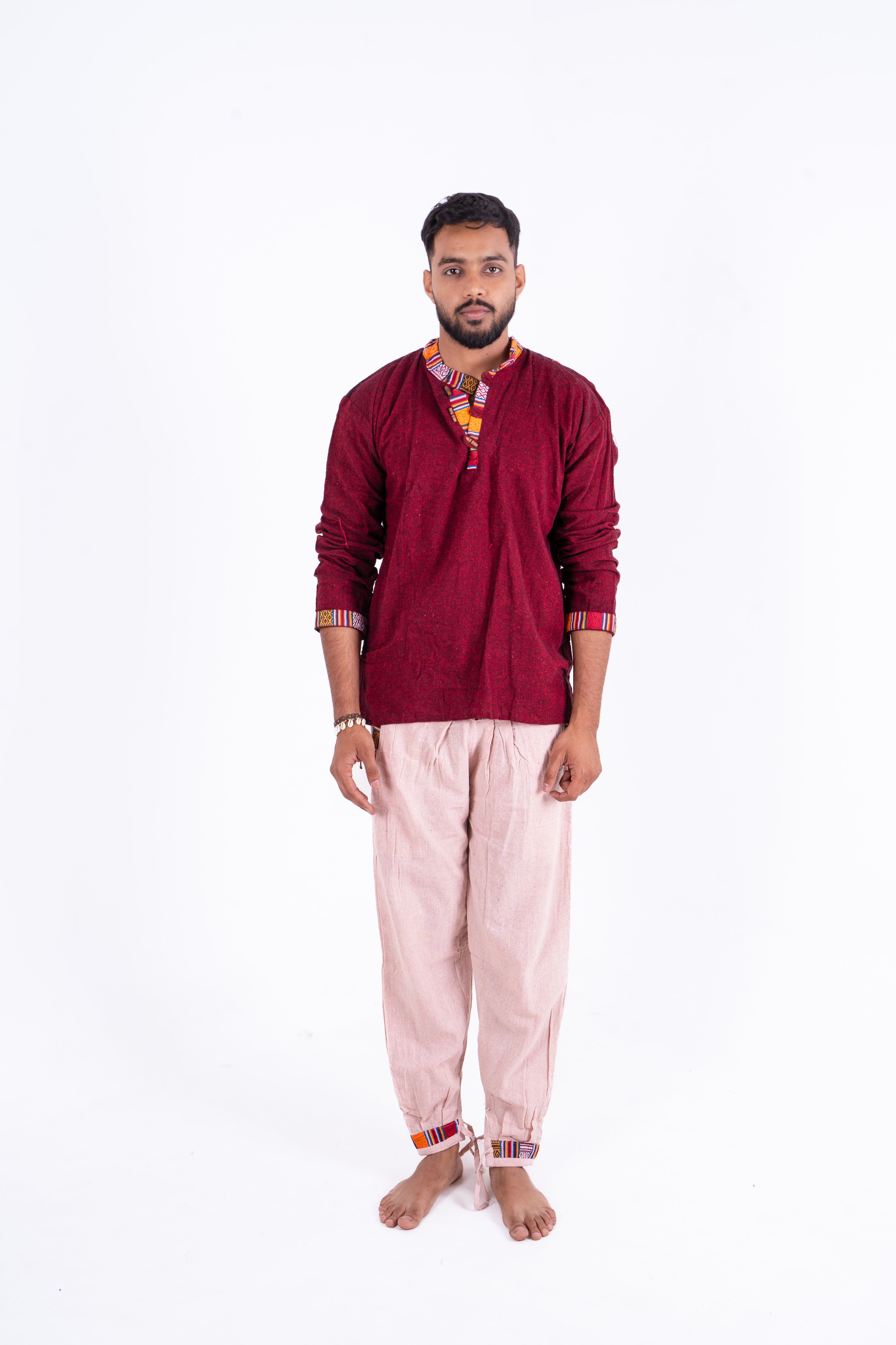 Maroon Bhutani Kurta Paired with White Cotton Pants